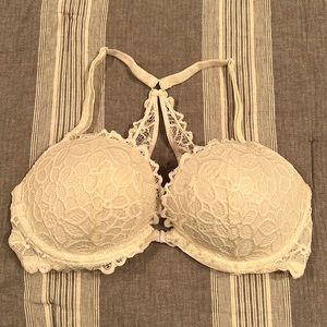 White lace Pink Victoria secret bra. Clips in front. Size 36D. Adjustable straps